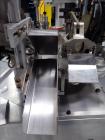 Used Kalix Model KX-600E automatic hot air plastic tube filler