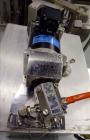 Used Kalix Model KX-600E automatic hot air plastic tube filler