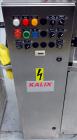 Used Kalix Model KX-600E automatic hot air plastic tube filler