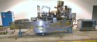 Used Norden Dual Head High Speed Tube Filler, Model NM 2000 HF for laminate tubes. Capable of 200 tubes per minute. Includes tube cleaning, cassette tube infeed, registration, and trimmer. Fill volum...