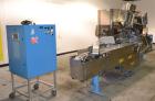 Used Norden Dual Head High Speed Tube Filler, Model NM 2000 HF for laminate tubes. Capable of 200 tubes per minute. Includes tube cleaning, cassette tube infeed, registration, and trimmer. Fill volum...