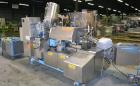Used Norden Dual Head High Speed Tube Filler, Model NM 2000 HF for laminate tubes. Capable of 200 tubes per minute. Includes tube cleaning, cassette tube infeed, registration, and trimmer. Fill volum...
