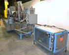 Used Norden Dual Head High Speed Tube Filler, Model NM 2000 HF for laminate tubes. Capable of 200 tubes per minute. Includes tube cleaning, cassette tube infeed, registration, and trimmer. Fill volum...