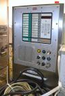 Used Norden Dual Head High Speed Tube Filler, Model NM 2000 HF for laminate tubes. Capable of 200 tubes per minute. Includes tube cleaning, cassette tube infeed, registration, and trimmer. Fill volum...