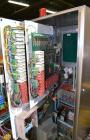 Used Norden Dual Head High Speed Tube Filler, Model NM 2000 HF for laminate tubes. Capable of 200 tubes per minute. Includes tube cleaning, cassette tube infeed, registration, and trimmer. Fill volum...