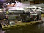 Used Norden Plastic Tube Filling Line Consisting Of: (1) Model NM2000 Norden tube filler, hinged cassette tube feeder, tube cleaning, vision system, cap torquing, twin head bottom up piston fill stat...