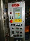 Used TGM S400 Tube Filler and Closing Machine for plastic and laminate tubes. Output 3,600 tubes/hour, tube diameter 0.4