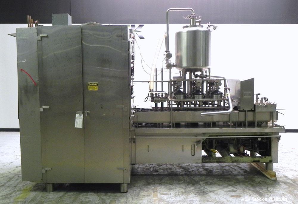 Used Cherry Burrell / Evergreen Q7 Gable Top Form fill seal carton filling machine, Model Q-7, Serial #4173, Handles 1/2 Pint, Pint and Quart Cartons. now set for quart 2-3/4 x 2-3/4 x 6-1/2" quart c...