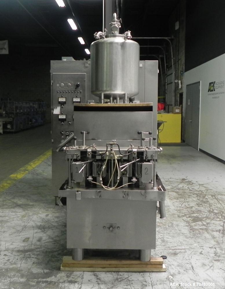 Used Cherry Burrell / Evergreen Q7 Gable Top Form fill seal carton filling machine, Model Q-7, Serial #4173, Handles 1/2 Pint, Pint and Quart Cartons. now set for quart 2-3/4 x 2-3/4 x 6-1/2" quart c...