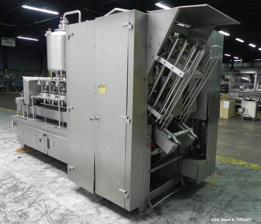 Used Cherry Burrell / Evergreen Q7 Gable Top Form fill seal carton filling machine, Model Q-7, Serial #4173, Handles 1/2 Pint, Pint and Quart Cartons. now set for quart 2-3/4 x 2-3/4 x 6-1/2" quart c...