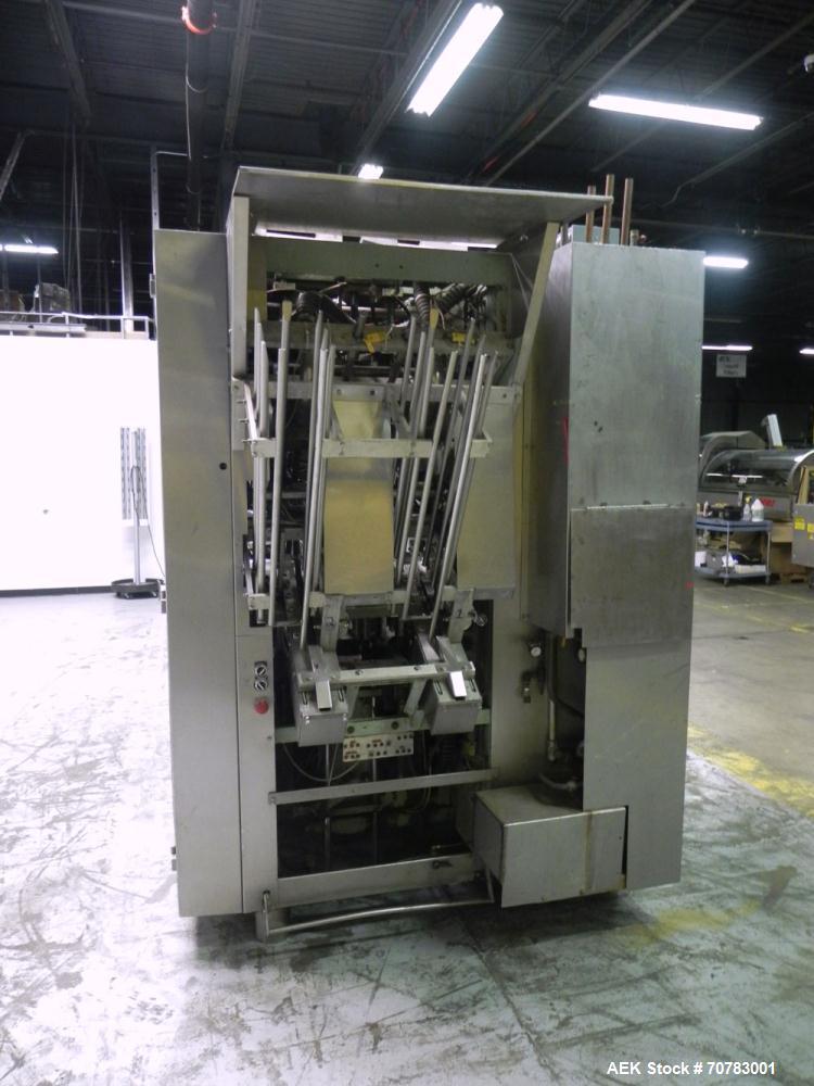 Used Cherry Burrell / Evergreen Q7 Gable Top Form fill seal carton filling machine, Model Q-7, Serial #4173, Handles 1/2 Pint, Pint and Quart Cartons. now set for quart 2-3/4 x 2-3/4 x 6-1/2" quart c...