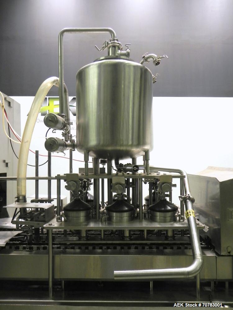Used Cherry Burrell / Evergreen Q7 Gable Top Form fill seal carton filling machine, Model Q-7, Serial #4173, Handles 1/2 Pint, Pint and Quart Cartons. now set for quart 2-3/4 x 2-3/4 x 6-1/2" quart c...