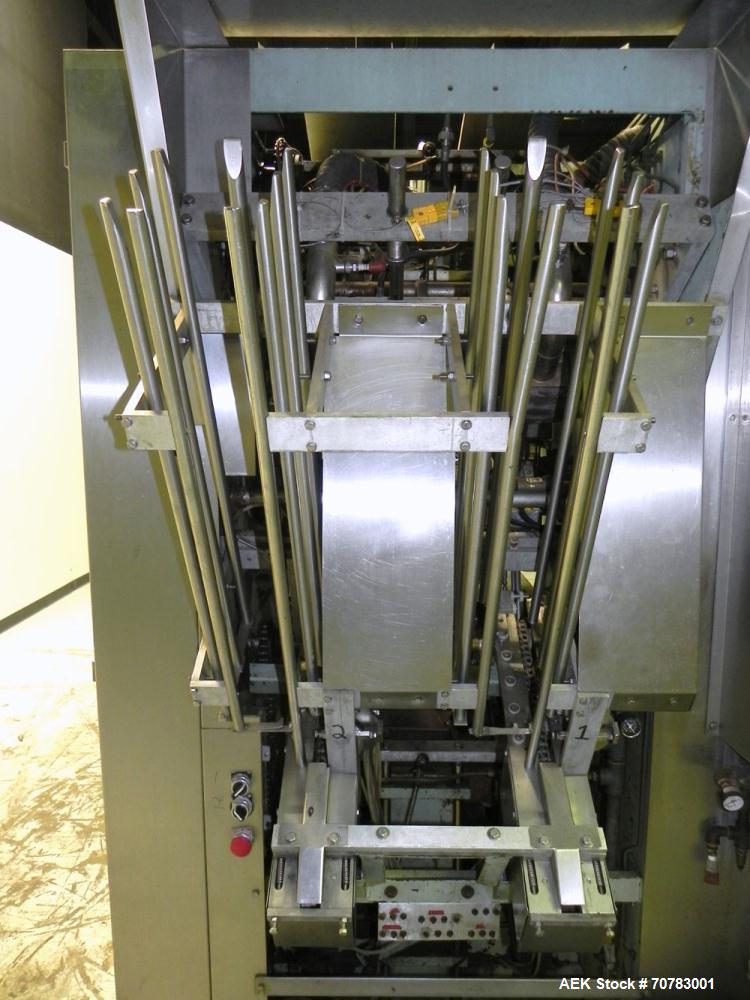 Used Cherry Burrell / Evergreen Q7 Gable Top Form fill seal carton filling machine, Model Q-7, Serial #4173, Handles 1/2 Pint, Pint and Quart Cartons. now set for quart 2-3/4 x 2-3/4 x 6-1/2" quart c...