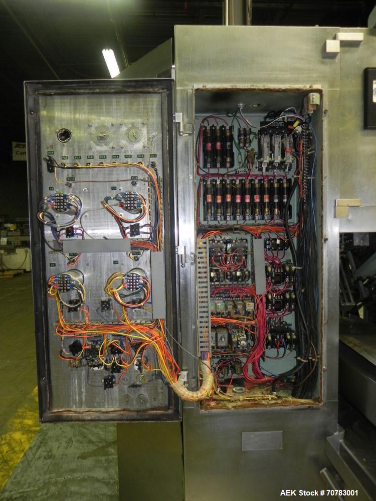 Used Cherry Burrell / Evergreen Q7 Gable Top Form fill seal carton filling machine, Model Q-7, Serial #4173, Handles 1/2 Pint, Pint and Quart Cartons. now set for quart 2-3/4 x 2-3/4 x 6-1/2" quart c...
