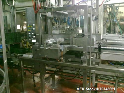 Used Evergreen Complete Filling Line, Model EQ5 ESL.  6,000 Cartons per hour, gable top carton cross faction 70 x 70.  Equipped with screw cap applicator, conveyors, stand alone CIP unit, 2 metal det...