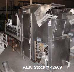 Used Haskon Inline Carton Filler, Model 540UES. Stainless steel clad frame. Sanitary contact parts. Designed to form, fill, seal liquid products using gravity type filling. Set for 1/2 gallons. (4) f...