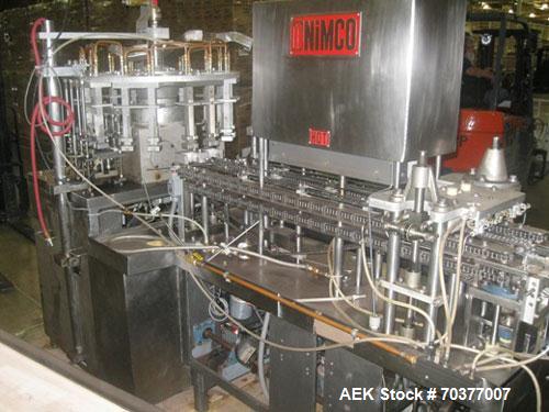 Used Nimco 5110E Gable Top Form Fill and Seal Machine, all stainless steel.  Transport chains set on 2-1/2" centers.  Dual carton magazine, runs two cartons per cycle.  Rated up to 110 cartons/minute...