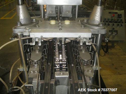 Used Nimco 5110E Gable Top Form Fill and Seal Machine, all stainless steel.  Transport chains set on 2-1/2" centers.  Dual carton magazine, runs two cartons per cycle.  Rated up to 110 cartons/minute...