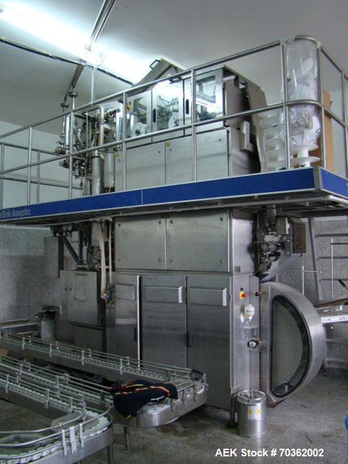 Used Tetra Pak TBA19-200B Line handling 6.76 fluid ounces (200 ml). Base units comprised of: (1) TBA19-200B aseptic carton filler, built 1997, 8375 work hours. (1) Tubex development straw applicator,...