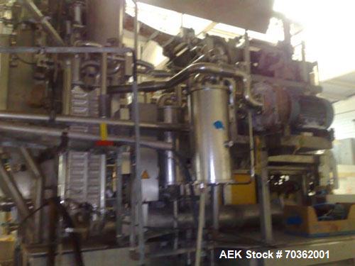 Used Tetra Pak TBA9-200B Line handling 6.76 fluid ounces (200 ml). Base units comprised of: (1) TBA 9-200B unit, built 1998, 50,131 work hours. (1) Tubex straw applicator, built 2000. (1) Tetra cardb...