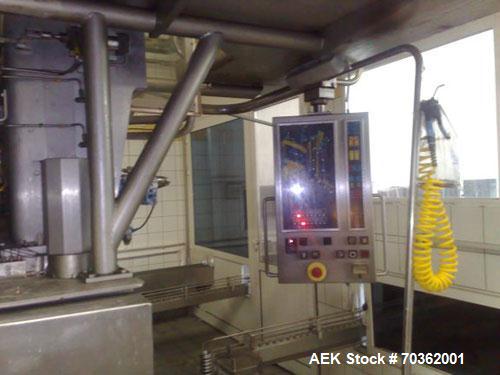 Used Tetra Pak TBA9-200B Line handling 6.76 fluid ounces (200 ml). Base units comprised of: (1) TBA 9-200B unit, built 1998, 50,131 work hours. (1) Tubex straw applicator, built 2000. (1) Tetra cardb...