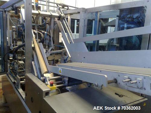 Used TetraPak Packaging Line handling 16.9 fluid ounces (500 ml) SLIM units. Comprised of: (1) TBA8-500ML S, built in 2003, 37,459 working hours. (1) Tetra cardboard packer 70, built 2003. (1) Approx...