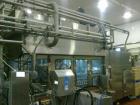 Used Evergreen Complete Filling Line, Model EQ5 ESL.  6,000 Cartons per hour, gable top carton cross faction 70 x 70.  Equipped with screw cap applicator, conveyors, stand alone CIP unit, 2 metal det...