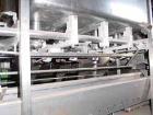 Used Haskon Inline Carton Filler, Model 540UES. Stainless steel clad frame. Sanitary contact parts. Designed to form, fill, seal liquid products using gravity type filling. Set for 1/2 gallons. (4) f...