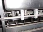 Used Haskon Inline Carton Filler, Model 540UES. Stainless steel clad frame. Sanitary contact parts. Designed to form, fill, seal liquid products using gravity type filling. Set for 1/2 gallons. (4) f...