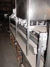 Used Haskon Inline Carton Filler, Model 540UES. Stainless steel clad frame. Sanitary contact parts. Designed to form, fill, seal liquid products using gravity type filling. Set for 1/2 gallons. (4) f...