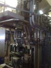 Used Tetra Pak TBA9-200B Line handling 6.76 fluid ounces (200 ml). Base units comprised of: (1) TBA 9-200B unit, built 1998, 50,131 work hours. (1) Tubex straw applicator, built 2000. (1) Tetra cardb...