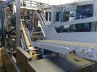 Used TetraPak Packaging Line handling 16.9 fluid ounces (500 ml) SLIM units. Comprised of: (1) TBA8-500ML S, built in 2003, 37,459 working hours. (1) Tetra cardboard packer 70, built 2003. (1) Approx...