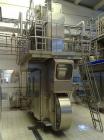 Used TetraPak Packaging Line handling 16.9 fluid ounces (500 ml) SLIM units. Comprised of: (1) TBA8-500ML S, built in 2003, 37,459 working hours. (1) Tetra cardboard packer 70, built 2003. (1) Approx...