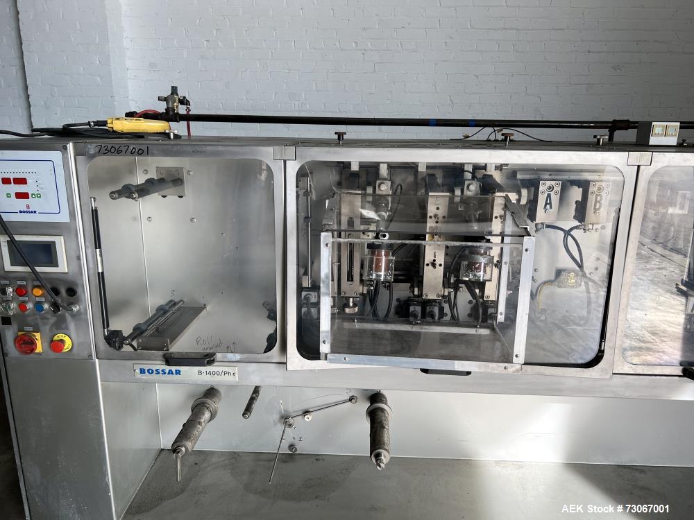 Used Bossar Form & Fill Horizontal Pouch Filler, Model B 1400 D. Capable of speeds up to 110. Size range 50mm to 140mm wide x 50mm to 210mm height. Maximum fill volume 400cc. Setup for 4 sided seal p...