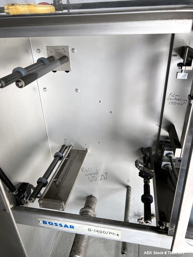 Used Bossar Form & Fill Horizontal Pouch Filler, Model B 1400 D. Capable of speeds up to 110. Size range 50mm to 140mm wide x 50mm to 210mm height. Maximum fill volume 400cc. Setup for 4 sided seal p...