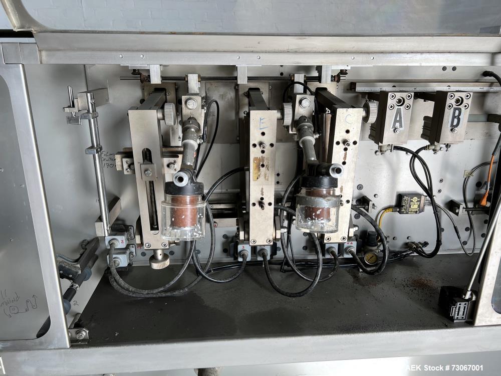 Used Bossar Form & Fill Horizontal Pouch Filler, Model B 1400 D. Capable of speeds up to 110. Size range 50mm to 140mm wide x 50mm to 210mm height. Maximum fill volume 400cc. Setup for 4 sided seal p...