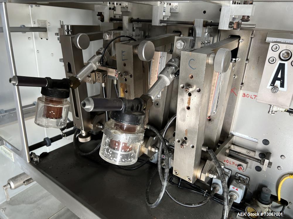 Used Bossar Form & Fill Horizontal Pouch Filler, Model B 1400 D. Capable of speeds up to 110. Size range 50mm to 140mm wide x 50mm to 210mm height. Maximum fill volume 400cc. Setup for 4 sided seal p...