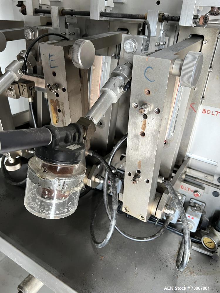 Used Bossar Form & Fill Horizontal Pouch Filler, Model B 1400 D. Capable of speeds up to 110. Size range 50mm to 140mm wide x 50mm to 210mm height. Maximum fill volume 400cc. Setup for 4 sided seal p...