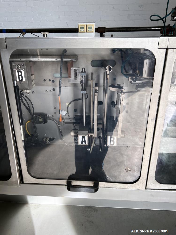 Used Bossar Form & Fill Horizontal Pouch Filler, Model B 1400 D. Capable of speeds up to 110. Size range 50mm to 140mm wide x 50mm to 210mm height. Maximum fill volume 400cc. Setup for 4 sided seal p...