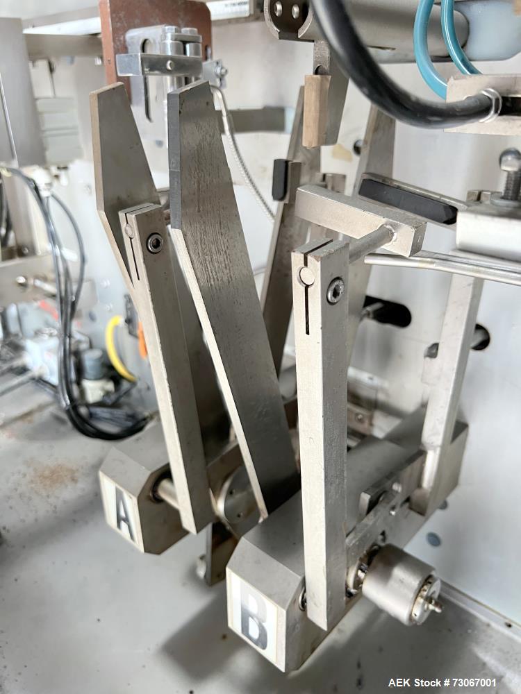 Used Bossar Form & Fill Horizontal Pouch Filler, Model B 1400 D. Capable of speeds up to 110. Size range 50mm to 140mm wide x 50mm to 210mm height. Maximum fill volume 400cc. Setup for 4 sided seal p...