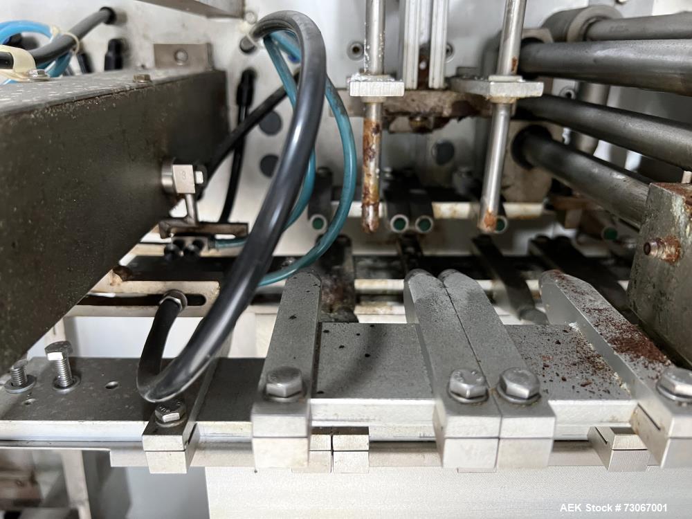 Used Bossar Form & Fill Horizontal Pouch Filler, Model B 1400 D. Capable of speeds up to 110. Size range 50mm to 140mm wide x 50mm to 210mm height. Maximum fill volume 400cc. Setup for 4 sided seal p...