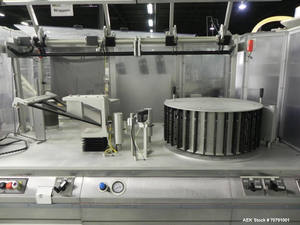 Used Cloud Packaging Systems Pouch Form Fill Seal, model ServOriginal High Speed Pouch Machine (sn 3289). Machine rated for speeds up to 2200 pouches per minute, set up on 2-1/2" centers. Line has Ke...