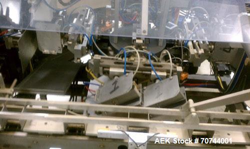 Used Cloud 2-1/2" Pitch ServOriginal High Speed Pouch Machine. 2500 Pouches per minute, set up on 2 1/2" centers and includes a Z-Automation model CH9-041 cartoner. Accommodates 24" rolls x 14"wide o...