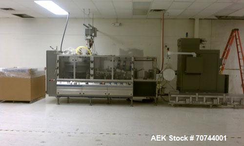 Used Cloud 2-1/2" Pitch ServOriginal High Speed Pouch Machine. 2500 Pouches per minute, set up on 2 1/2" centers and includes a Z-Automation model CH9-041 cartoner. Accommodates 24" rolls x 14"wide o...