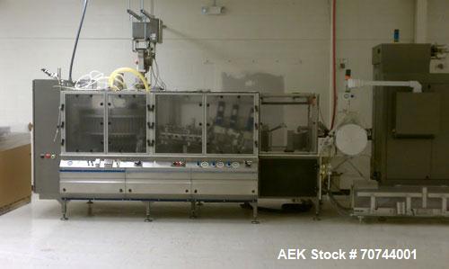 Used Cloud 2-1/2" Pitch ServOriginal High Speed Pouch Machine. 2500 Pouches per minute, set up on 2 1/2" centers and includes a Z-Automation model CH9-041 cartoner. Accommodates 24" rolls x 14"wide o...