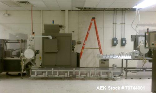 Used Cloud 2-1/2" Pitch ServOriginal High Speed Pouch Machine. 2500 Pouches per minute, set up on 2 1/2" centers and includes a Z-Automation model CH9-041 cartoner. Accommodates 24" rolls x 14"wide o...