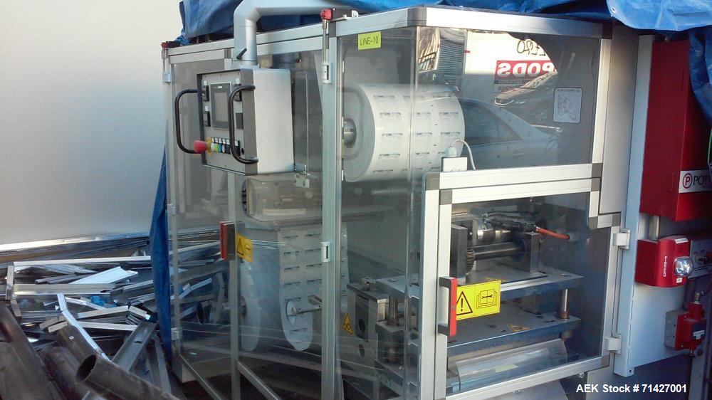 Used - Easysnap Packaging Machine, Model BB3. Monodose sachet machine can handle liquid or semi-dense products. Speed up to 120 Easysnap per minute. Max consumption 12 Kw/H. Air consumption 250/400 N...