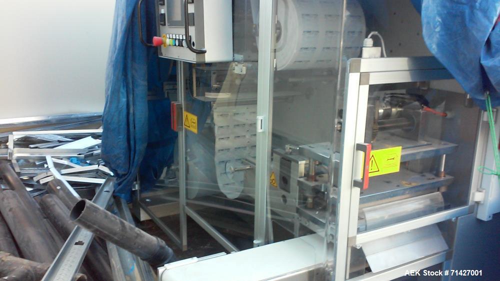 Used - Easysnap Packaging Machine, Model BB3. Monodose sachet machine can handle liquid or semi-dense products. Speed up to 120 Easysnap per minute. Max consumption 12 Kw/H. Air consumption 250/400 N...