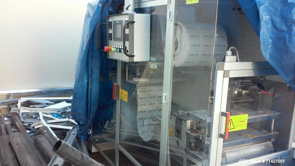 Used - Easysnap Packaging Machine, Model BB3. Monodose sachet machine can handle liquid or semi-dense products. Speed up to 120 Easysnap per minute. Max consumption 12 Kw/H. Air consumption 250/400 N...