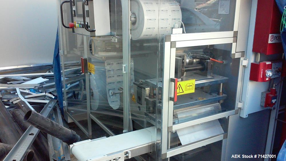 Used - Easysnap Packaging Machine, Model BB3. Monodose sachet machine can handle liquid or semi-dense products. Speed up to 120 Easysnap per minute. Max consumption 12 Kw/H. Air consumption 250/400 N...